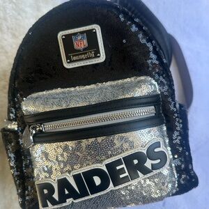 This is a BRAND NEW Loungefly mini backpack.